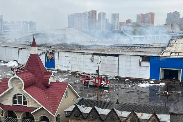 RUSSIA, MOSCOW - MAY 13, 2026: Buildings in Vernisazhnaya Street in the aftermath of a fire. The fire covered a floor area of 3,000 sq m, causing the roof to collapse. The adjacent Izmailovo Kremlin and Stalin s Bunker remaned intact. Sergei Shakhidzhanyan TASS  92396481