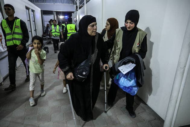 Group of Palestinians return to Gaza via Rafah Border Crossing KHAN YUNIS, GAZA, PALESTINE - MAY 13: A group of Palestinians, including those who received medical treatment in Egypt and their companions, arrive in the city of Khan Yunis, Gaza, Palestine via the Rafah Border Crossing on May 13, 2026. After Israel permitted limited passage, the returning Palestinians were greeted by their families and relatives following their journey back into the Gaza Strip. Abed Rahim Khatib Anadolu Khan Yunis Gaza. Editorial use only. Please get in touch for any other usage.  Copyright: x2026xAnadoluxAbedxRahimxKhatibx