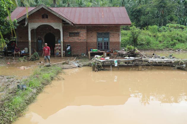 Aftermath of flood in Sumatra TANAH DATAR, INDONESIA - MAY 13: A view of the destruction among the wooden debris affected by floods in Tanah Datar, West Sumatera Province, Indonesia on May 13, 2026. The structures affected by the floods include residential homes, vehicle, irrigation dam, two village bridge, subdistrict roads, and the rice field. Adi Prima Anadolu Tanah Datar Indonesia. Editorial use only. Please get in touch for any other usage.  Copyright: x2026xAnadoluxAdixPrimax