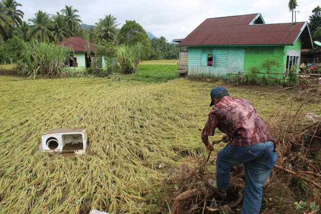 Aftermath of flood in Sumatra TANAH DATAR, INDONESIA - MAY 13: A view of the destruction among the wooden debris affected by floods in Tanah Datar, West Sumatera Province, Indonesia on May 13, 2026. The structures affected by the floods include residential homes, vehicle, irrigation dam, two village bridge, subdistrict roads, and the rice field. Adi Prima Anadolu Tanah Datar Indonesia. Editorial use only. Please get in touch for any other usage.  Copyright: x2026xAnadoluxAdixPrimax