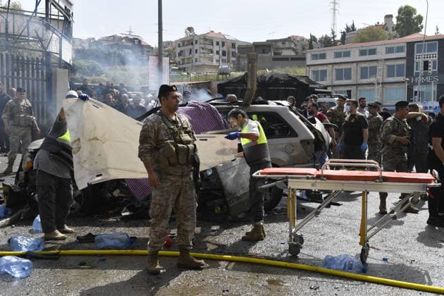Israeli targets vehicles in Beirut despite the ceasefire BEIRUT, LEBANON - MAY 13: Medical teams, soldiers and civilians arrived at the scene to inspect the area after the Israeli army targeted two vehicles with drones on the coastal road despite the ceasefire in Beirut, Lebanon on May 13, 2026. The vehicles, struck on the Jiyyeh highway, caught fire and were rendered unusable. Houssam Shbaro Anadolu Beirut Lebanon. Editorial use only. Please get in touch for any other usage.  Copyright: x2026xAnadoluxHoussamxShbarox