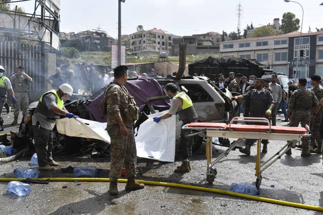 Israeli targets vehicles in Beirut despite the ceasefire BEIRUT, LEBANON - MAY 13: Medical teams, soldiers and civilians arrived at the scene to inspect the area after the Israeli army targeted two vehicles with drones on the coastal road despite the ceasefire in Beirut, Lebanon on May 13, 2026. The vehicles, struck on the Jiyyeh highway, caught fire and were rendered unusable. Houssam Shbaro Anadolu Beirut Lebanon. Editorial use only. Please get in touch for any other usage.  Copyright: x2026xAnadoluxHoussamxShbarox