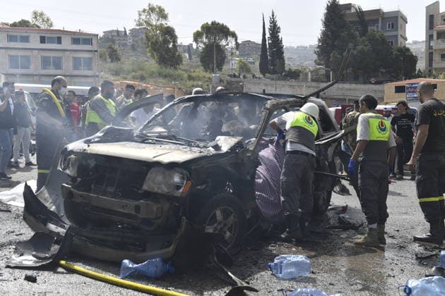 Israeli targets vehicles in Beirut despite the ceasefire BEIRUT, LEBANON - MAY 13: Medical teams, soldiers and civilians arrived at the scene to inspect the area after the Israeli army targeted two vehicles with drones on the coastal road despite the ceasefire in Beirut, Lebanon on May 13, 2026. The vehicles, struck on the Jiyyeh highway, caught fire and were rendered unusable. Houssam Shbaro Anadolu Beirut Lebanon. Editorial use only. Please get in touch for any other usage.  Copyright: x2026xAnadoluxHoussamxShbarox