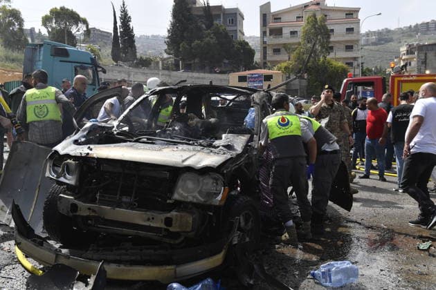 Israeli targets vehicles in Beirut despite the ceasefire BEIRUT, LEBANON - MAY 13: Medical teams, soldiers and civilians arrived at the scene to inspect the area after the Israeli army targeted two vehicles with drones on the coastal road despite the ceasefire in Beirut, Lebanon on May 13, 2026. The vehicles, struck on the Jiyyeh highway, caught fire and were rendered unusable. Houssam Shbaro Anadolu Beirut Lebanon. Editorial use only. Please get in touch for any other usage.  Copyright: x2026xAnadoluxHoussamxShbarox
