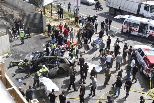 Israeli targets vehicles in Beirut despite the ceasefire BEIRUT, LEBANON - MAY 13: Medical teams, soldiers and civilians arrived at the scene to inspect the area after the Israeli army targeted two vehicles with drones on the coastal road despite the ceasefire in Beirut, Lebanon on May 13, 2026. The vehicles, struck on the Jiyyeh highway, caught fire and were rendered unusable. Houssam Shbaro Anadolu Beirut Lebanon. Editorial use only. Please get in touch for any other usage.  Copyright: x2026xAnadoluxHoussamxShbarox