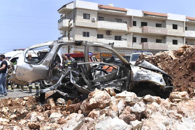 Israeli military carried out a drone strike in Beirut despite ceasefire BEIRUT, LEABANON - MAY 13: A view of burnt car after an Israeli drone strike in Saadiyat, south of Beirut, Lebanon on May 13, 2026. Despite a ceasefire, the Israeli military targeted a total of seven vehicles across different areas of Lebanon since the early hours of the morning using unmanned aerial vehicles (UAVs). In Saadiyat, one of the targeted vehicles was set ablaze and became completely unusable. Firefighters and soldiers arrived at the scene, carried out inspections, and secured the surrounding area. Houssam Shbaro Anadolu Beirut Lebanon. Editorial use only. Please get in touch for any other usage.  Copyright: x2026xAnadoluxHoussamxShbarox