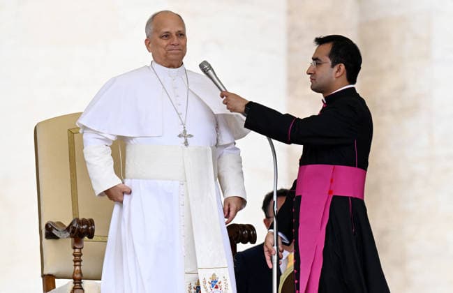 Pope Leo XIV Leads The General Audience - Vatican Pope Leo XIV attends the weekly general audience in Saint Peter’s square, Vatican on May 13, 2026. RIGHT: Edgard Ivan Rimaycuna Inga, pope’s private secretary. Photo by Eric Vandeville ABACAPRESS.COM Rome Vatican (or Holy See)  Copyright: xVandevillexEric ABACAx