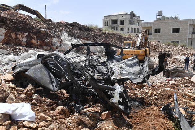 Israeli military carried out a drone strike in Beirut despite ceasefire BEIRUT, LEABANON - MAY 13: A view of burnt car after an Israeli drone strike in Saadiyat, south of Beirut, Lebanon on May 13, 2026. Despite a ceasefire, the Israeli military targeted a total of seven vehicles across different areas of Lebanon since the early hours of the morning using unmanned aerial vehicles (UAVs). In Saadiyat, one of the targeted vehicles was set ablaze and became completely unusable. Firefighters and soldiers arrived at the scene, carried out inspections, and secured the surrounding area. Houssam Shbaro Anadolu Beirut Lebanon. Editorial use only. Please get in touch for any other usage.  Copyright: x2026xAnadoluxHoussamxShbarox