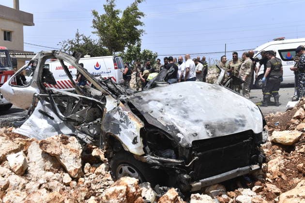 Israeli military carried out a drone strike in Beirut despite ceasefire BEIRUT, LEABANON - MAY 13: A view of burnt car after an Israeli drone strike in Saadiyat, south of Beirut, Lebanon on May 13, 2026. Despite a ceasefire, the Israeli military targeted a total of seven vehicles across different areas of Lebanon since the early hours of the morning using unmanned aerial vehicles (UAVs). In Saadiyat, one of the targeted vehicles was set ablaze and became completely unusable. Firefighters and soldiers arrived at the scene, carried out inspections, and secured the surrounding area. Houssam Shbaro Anadolu Beirut Lebanon. Editorial use only. Please get in touch for any other usage.  Copyright: x2026xAnadoluxHoussamxShbarox