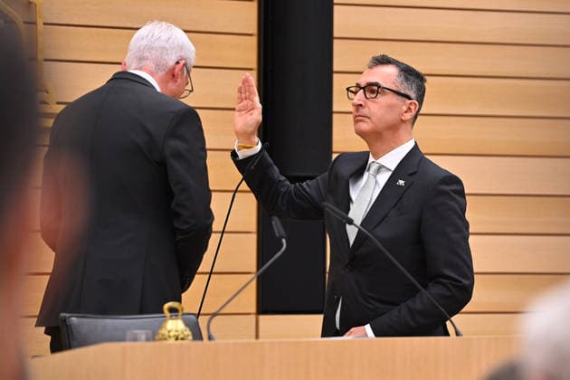 Swearing-in ceremony Cem OEZDEMIR State Premier of Baden Wuerttemberg, left State Parliament President Thomas STROBL, swears the oath of office as State Premier of Baden Wuerttemberg on 13 May 2026 in the State Parliament in Stuttgart