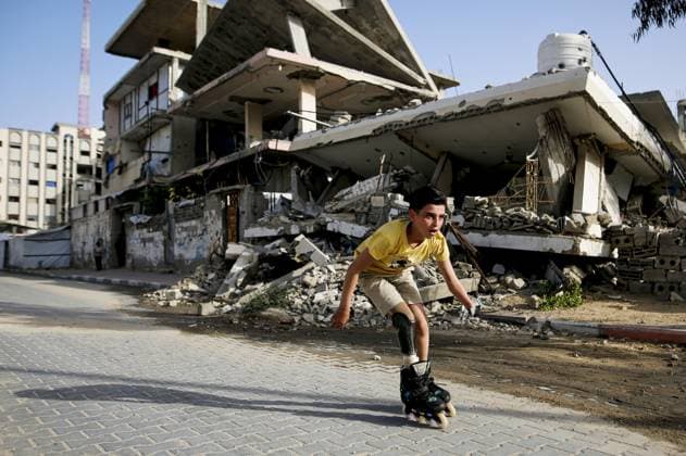 Gaza child who lost limbs in Israeli attacks holds onto life with skating GAZA CITY, GAZA, PALESTINE - MAY 12: Thirteen-year-old Akram al-Fayyumi, who lost his left arm and right foot in an Israeli attack on Gaza, skates on the streets of Gaza City, Gaza, Palestine on May 12, 2026. Akram is holding on to life through his passion for skating and horse riding. Despite using a prosthetic leg fitted in Egypt that he finds uncomfortable, he continues to skate. His only dream is to have a new prosthesis and a horse. Living in the Tel al-Hawa area of Gaza City, Akram says that skating is his greatest source of happiness. Saeed M. M. T. Jaras Anadolu Gaza City Gaza. Editorial use only. Please get in touch for any other usage.  Copyright: x2026xAnadoluxSaeedxM.xM.xT.xJarasx