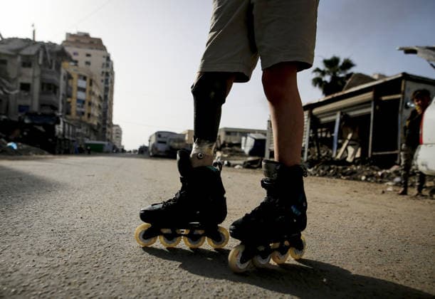 Gaza child who lost limbs in Israeli attacks holds onto life with skating GAZA CITY, GAZA, PALESTINE - MAY 12: Thirteen-year-old Akram al-Fayyumi, who lost his left arm and right foot in an Israeli attack on Gaza, skates on the streets of Gaza City, Gaza, Palestine on May 12, 2026. Akram is holding on to life through his passion for skating and horse riding. Despite using a prosthetic leg fitted in Egypt that he finds uncomfortable, he continues to skate. His only dream is to have a new prosthesis and a horse. Living in the Tel al-Hawa area of Gaza City, Akram says that skating is his greatest source of happiness. Saeed M. M. T. Jaras Anadolu Gaza City Gaza. Editorial use only. Please get in touch for any other usage.  Copyright: x2026xAnadoluxSaeedxM.xM.xT.xJarasx