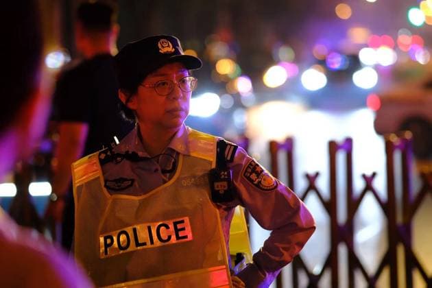 China US 9163794 13.05.2026 A Chinese police officer stands guard outside the Four Seasons Hotel, where the motorcade of U.S. President Donald Trump arrived, in Beijing, China. Trump has arrived in Beijing on a three-day state visit, which became the first visit of the U.S. leader to China in nine years. Alexey Tashchilin Sputnik Beijing China  Copyright: xAlexeyxTashchilinx
