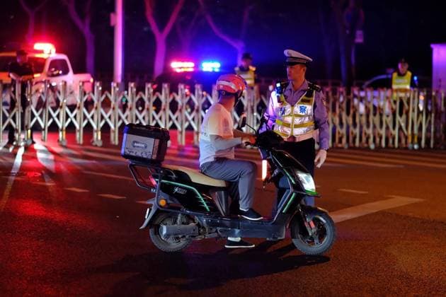 China US 9163802 13.05.2026 A Chinese police officer stands guard outside the Four Seasons Hotel, where the motorcade of U.S. President Donald Trump arrived, in Beijing, China. Trump has arrived in Beijing on a three-day state visit, which became the first visit of the U.S. leader to China in nine years. Alexey Tashchilin Sputnik Beijing China  Copyright: xAlexeyxTashchilinx