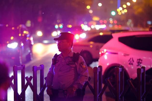 China US 9163814 13.05.2026 A Chinese police officer stands guard outside the Four Seasons Hotel, where the motorcade of U.S. President Donald Trump arrived, in Beijing, China. Trump has arrived in Beijing on a three-day state visit, which became the first visit of the U.S. leader to China in nine years. Alexey Tashchilin Sputnik Beijing China  Copyright: xAlexeyxTashchilinx