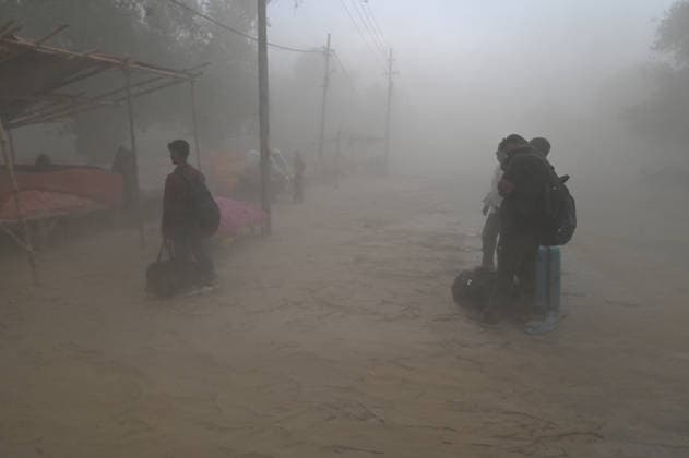 May 13, 2026, Prayagraj, Uttar Pradesh, India: Prayagraj: People during heavy dust storm, in Prayagraj on Wednesday, May 13, 2026. Prayagraj India  - ZUMAv115 20260513_zap_v115_027 Copyright: xPrabhatxKumarxVermax
