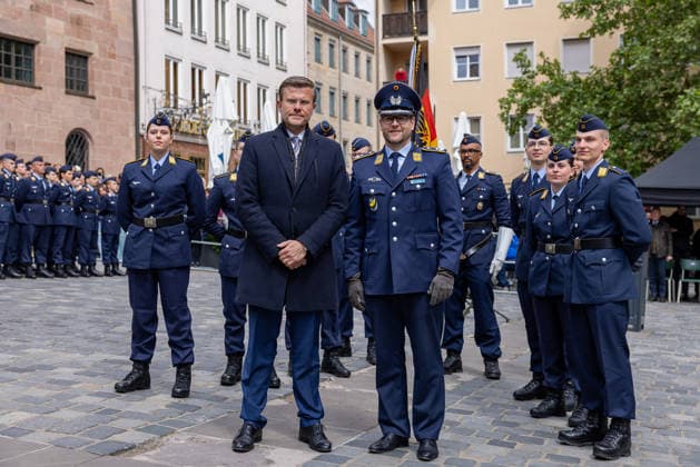 Public pledge of the German Armed Forces on Sebalder Platz, Nuremberg, 13 05 2026 Lord Mayor Marcus König and Lieutenant Colonel Christian Zerau, Commander of the Germersheim Air Force Training Battalion, stand in front of the Air Force recruits after the ceremonial pledge Nuremberg Old Town Saint Sebald Bavaria Germany 20260513-286A7399-M4000