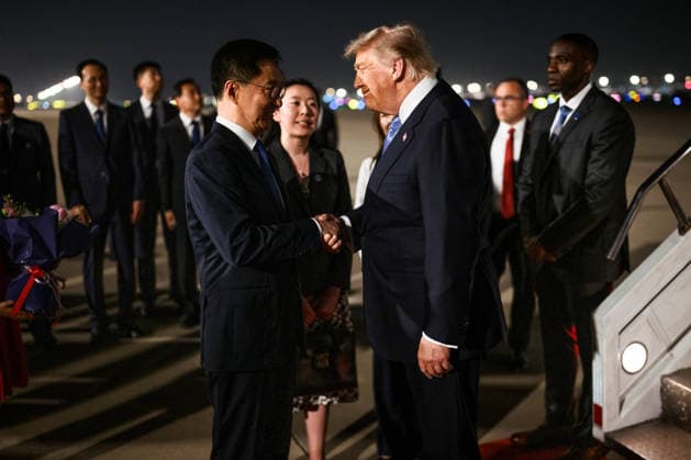 President Donald Trump arrives at Beijing Capital International Airport in Beijing, China, on Wednesday, May 13, 2026, where he is greeted by China s Vice President Han Zheng and feted with an elaborate arrival ceremony. Photo via The White House  WAX2026051301 THExWHITExHOUSE
