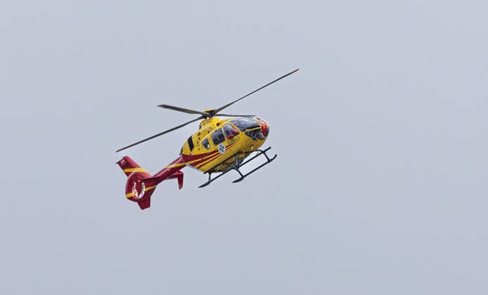 13 05 2026 Rescue helicopter Gallus 2 approaching the hospital in Innsbruck, Tyrol, Austria Helicopter lands on the roof of the Tyrol Clinics, emergency helicopter approaching the Innsbruck State Hospital, emergency doctor helicopter lands on the roof of the university hospital, university clinic, air rescue, air