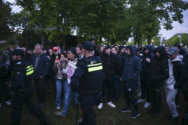Violent Protest at Asylum Shelter in Loosdrecht LOOSDRECHT, NETHERLANDS - MAY 13: Police officers and emergency services respond after a protest outside a temporary asylum shelter turned violent, leading to several arrests after demonstrators reportedly set fires and launched projectiles near the facility in Loosdrecht, Netherlands, on May 13, 2026. Mouneb Taim Anadolu Loosdrecht Netherlands. Editorial use only. Please get in touch for any other usage.  Copyright: x2026xAnadoluxMounebxTaimx