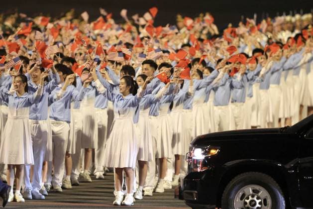 BEIJING, CHINA - MAY 13: Chinese youth join officials to welcome U.S. President Donald Trump at Beijing Capital International Airport on May 13, 2026 in Beijing, China. U.S. President Donald Trump arrived in Beijing on Wednesday evening for a state visit to China.  Copyright: xChinaxNewsxServicex 111641348845