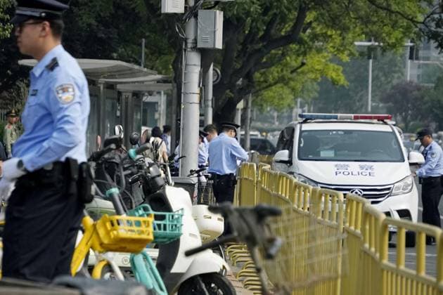 Tightened security in Beijing Security officers patrol in Beijing on May 14, 2026, ahead of a summit between U.S. President Donald Trump and his Chinese counterpart Xi Jinping the same day.  A14AA0005554800P