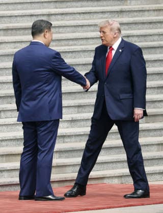 U.S. President Trump in Beijing U.S. President Donald Trump (R), shakes hands with his Chinese counterpart Xi Jinping as he arrives at the Great Hall of the People in Beijing for a welcoming ceremony on May 14, 2026.  A14AA0005554804P