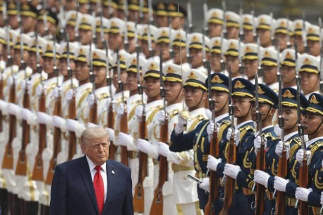 U.S. President Trump in Beijing U.S. President Donald Trump receives a guard of honor during a welcoming ceremony at the Great Hall of the People in Beijing on May 14, 2026.  A14AA0005554808P