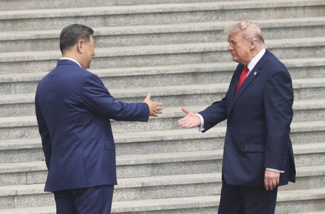 U.S. President Trump in Beijing U.S. President Donald Trump (L) shakes hands with Chinese President Xi Jinping upon arrival at the Great Hall of the People in Beijing, on May 14, 2026.  A14AA0005554810P