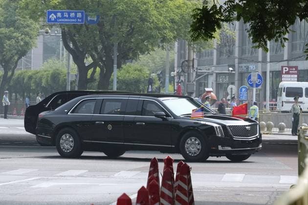 U.S. President Trump in Beijing A car believed to be carrying U.S. President Donald Trump travels through Beijing on May 14, 2026, during his visit to China under heightened security.  A14AA0005554839P