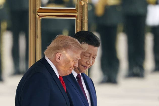U.S. President Trump in Beijing U.S. President Donald Trump (foreground), alongside Chinese President Xi Jinping, attends a welcome ceremony at the Great Hall of the People in Beijing on May 14, 2026.  A14AA0005554842P