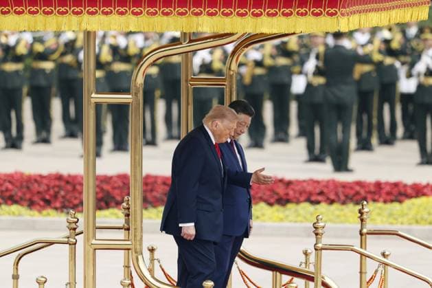 U.S. President Trump in Beijing U.S. President Donald Trump (foreground), alongside Chinese President Xi Jinping, attends a welcome ceremony at the Great Hall of the People in Beijing on May 14, 2026.  A14AA0005554843P