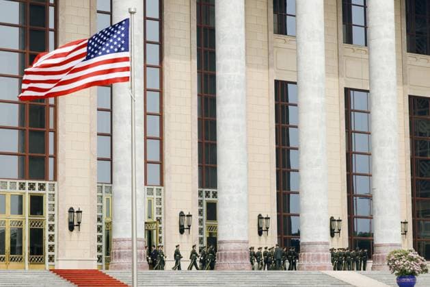 U.S.-China summit in Beijing A U.S. national flag is hoisted at the Great Hall of the People in Beijing ahead of a summit meeting between U.S. President Donald Trump and Chinese President Xi Jinping on May 14, 2026. (Pool photo)  A14AA0005555124P