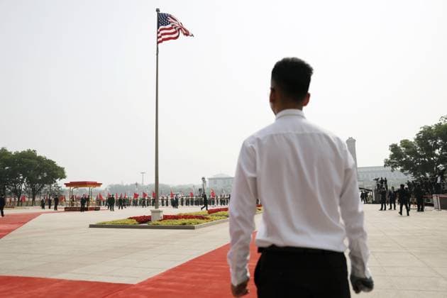U.S.-China summit in Beijing A U.S. national flag is hoisted at the Great Hall of the People in Beijing ahead of a summit meeting between U.S. President Donald Trump and Chinese President Xi Jinping on May 14, 2026. (Pool photo)  A14AA0005555125P
