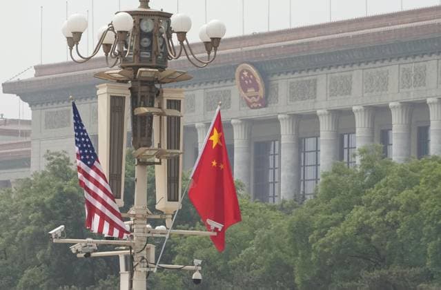U.S. President Trump in Beijing U.S. and Chinese national flags are hoisted at Tiananmen Square in Beijing during U.S. President Donald Trump s visit to Beijing for a summit meeting with Chinese President Xi Jinping on May 14, 2026.  A14AA0005555186P