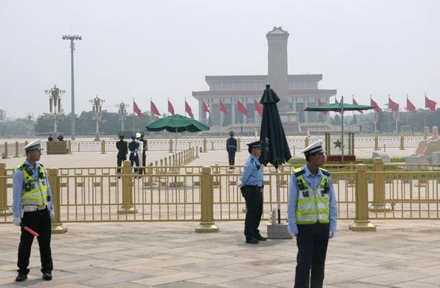 U.S. President Trump in Beijing Police officers stand guard at Tiananmen Square in Beijing on May 14, 2026, as U.S. President Donald Trump visits the Chinese capital for a summit meeting with Chinese President Xi Jinping.  A14AA0005555500P