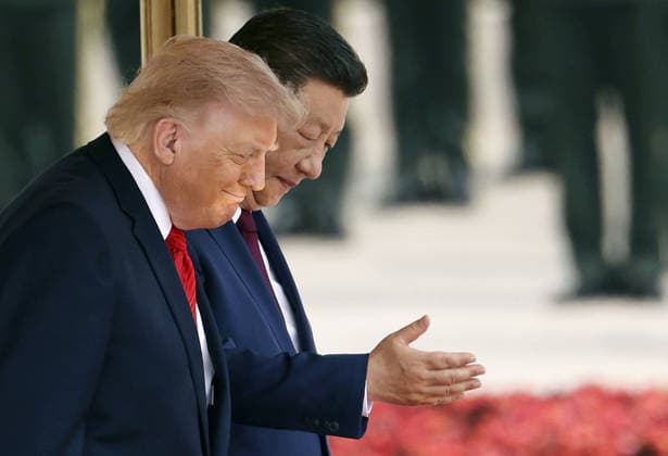 U.S. President Trump in Beijing U.S. President Donald Trump (front), alongside Chinese President Xi Jinping, attends a welcome ceremony at the Great Hall of the People in Beijing on May 14, 2026. (Pool photo)  A14AA0005555674P