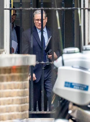 May 14, 2026, London, London, UK: London, UK. Prime Minister Sir Keir Starmer leaves Downing Street through the back entrance. The Prime Minister is under growing political pressure as he fights to remain in power amid speculation about challenges to his leadership. London UK  - ZUMAl94_ 20260514_zaf_l94_013 Copyright: xMarcinxNowakx