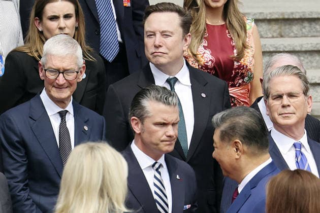 U.S. President Trump in Beijing Chinese President Xi Jinping (front, R) attends a welcome ceremony for U.S. President Donald Trump (not seen) at the Great Hall of the People in Beijing on May 14, 2026. U.S. Defense Secretary Pete Hegseth (front, L), Apple Inc. CEO Tim Cook (2nd row, L), Tesla Inc. CEO Elon Musk (2nd row, C) and U.S. Treasury Secretary Scott Bessent (2nd row, R) also attended the ceremony. (Pool photo)  A14AA0005555964P