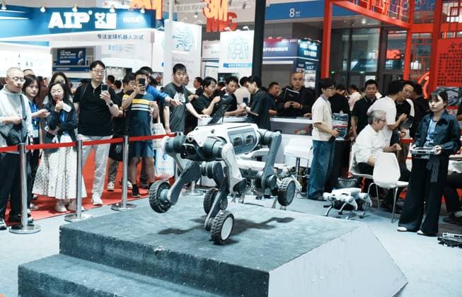 HRTE2026 Held in Hangzhou The audience watched DEEP Robotics quadruped intelligent robot (robot dog) perform a climbing performance at the 2nd Hangzhou International Humanoid Robot and Robotics Technology Exhibition in Hangzhou, Zhejiang Province, China on May 14, 2026. Hangzhou Zhejiang China  Copyright: xCFOTOx i1778781921258