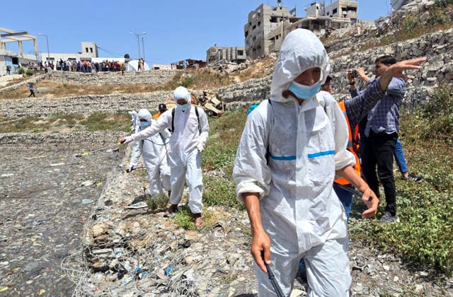 Gaza municipality launches insect control campaign in northern Gaza City Field crews from Gaza Municipality carry out pesticide spraying operations as part of a campaign to combat mosquitoes and harmful insects near Sheikh Radwan pond north of Gaza City on May 14, 2026. The campaign, implemented in cooperation with the Turkish Hudaei Foundation, is scheduled to continue for one week and aims to spray around 300 liters of pesticides in different areas amid deteriorating environmental and health conditions in the Gaza Strip. Photo by Mekael Bhar apaimages Gaza city Gaza Strip Palestinian Territory 140526_Gaza_MB_00(6) Copyright: xapaimagesxMekaelxBharx xapaimagesx