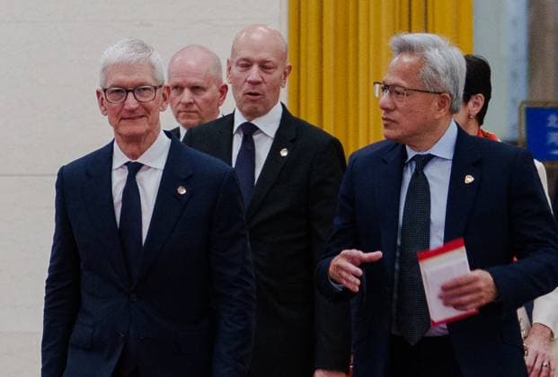 China US 9164681 14.05.2026 Apple CEO Tim Cook (left) and Nvidia founder Jensen Huang arrive at the Great Hall of the People for a meeting with Chinese Premier Li Qiang in Beijing, China. Representatives of American companies accompany US President Donald Trump on his state visit to China. Anna Ratkoglo Sputnik Beijing China  Copyright: xAnnaxRatkoglox