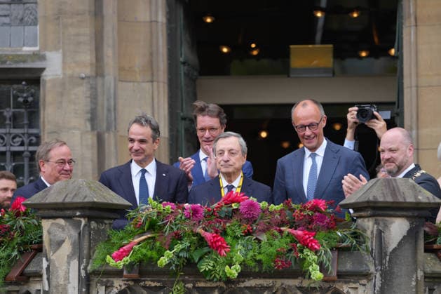 Presentation of the International Charlemagne Prize 2026 in Aachen Armin Laschet, Chairman of the Charlemagne Prize Board of Directors, together with the laureate Professor Mario Draghi, Lord Mayor Michael Ziemons, NRW Minister President Hendrik Wuest, Federal Chancellor Friedrich Merz and Kyr