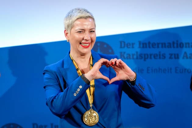Presentation of the International Charlemagne Prize 2026 in Aachen Maria Kalesnikava thanks with a gesture and forms a heart with her hands at the ceremony for the presentation of the International Charlemagne Prize 2026 in the Kroenungssaal of Aachen City Hall, Aachen, 14 05 2026 Aachen NRW Germany