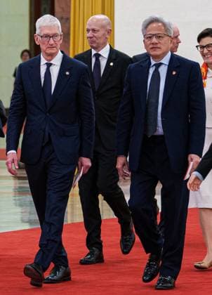 China US 9164707 14.05.2026 Apple CEO Tim Cook (left) and Nvidia founder Jensen Huang arrive at the Great Hall of the People for a meeting with Chinese Premier Li Qiang in Beijing, China. Representatives of American companies accompany US President Donald Trump on his state visit to China. Anna Ratkoglo Sputnik Beijing China  Copyright: xAnnaxRatkoglox