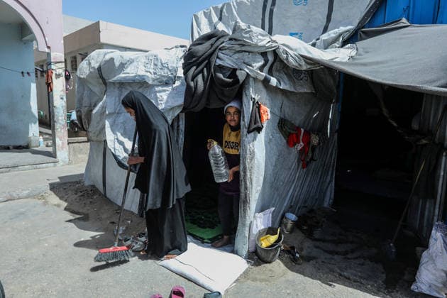 Displaced Palestinians in Khan Yunis struggle under harsh conditions KHAN YUNIS, GAZA, PALESTINE - MAY 14: Displaced Palestinians continue to struggle under difficult conditions in Khan Yunis, Gaza, Palestine on May 14, 2026. Living in tents and temporary shelters with limited resources, Palestinians endure the pain on the anniversary of Nakba ( Great Catastrophe ) amid destruction caused by the Israeli army. Abed Rahim Khatib Anadolu Khan Yunis Gaza. Editorial use only. Please get in touch for any other usage.  Copyright: x2026xAnadoluxAbedxRahimxKhatibx