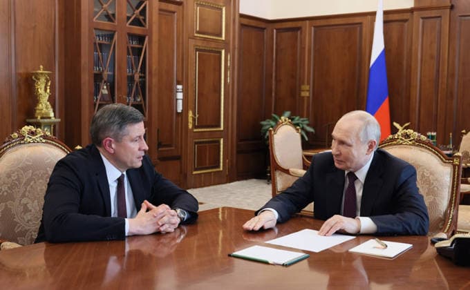 May 14, 2026, Moscow, Moscow Oblast, Russia: Russian President Vladimir Putin, listens to newly appointed acting governor of Bryansk region Yegor Kovalchuk, left, during a face-to-face meeting at the Kremlin, May 13, 2026 in Moscow, Russia. The governors of two Russian regions ‌bordering Ukraine, stepped down and their ‹replacements met with President Vladimir Putin. Moscow Russia - ZUMAp138 20260514_zaa_p138_011 Copyright: xMikhailxMetzel RussianxGovernmenx