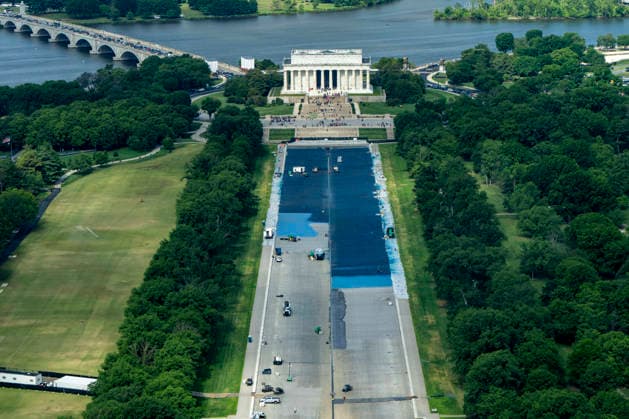 The reflecting pool is seen during its paint renovation in Washington, DC on Thursday, May 14, 2026. The cost of President Donald Trump s ongoing renovation of the Lincoln Memorial reflecting pool is nearing $15 million, as workers continue resurfacing the bottom of the Lincoln Memorial Reflecting Pool with American flag blue -colored material as part of his Safe and Beautiful campaign to clean up parks and monuments in the city.  WAP20260514324 BONNIExCASH