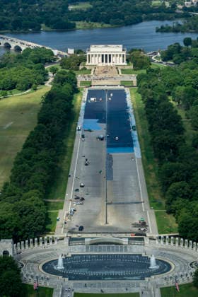 The reflecting pool is seen during its paint renovation in Washington, DC on Thursday, May 14, 2026. The cost of President Donald Trump s ongoing renovation of the Lincoln Memorial reflecting pool is nearing $15 million, as workers continue resurfacing the bottom of the Lincoln Memorial Reflecting Pool with American flag blue -colored material as part of his Safe and Beautiful campaign to clean up parks and monuments in the city.  WAP20260514327 BONNIExCASH