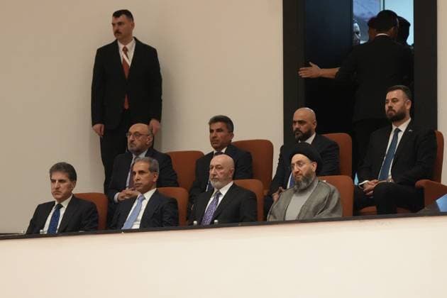 Iraq s new Prime Minister Zeydi and the 14 ministers of his cabinet receive a vote of confidence in Parliament BAGHDAD, IRAQ - MAY 14:President of the Iraqi Kurdish Regional Government (KRG) Nechirvan Barzani and leader of the National Wisdom Movement Ammar al-Hakim (R) attend a parliamentary session as most members of his cabinet received a vote of confidence in Baghdad, Iraq on May 14, 2026. During the session, parliament approved the government program as well as Prime Minister al-Zaidi and 14 cabinet nominees by absolute majority. Murtadha Al-Sudani Anadolu Baghdad Iraq. Editorial use only. Please get in touch for any other usage.  Copyright: x2026xAnadoluxMurtadhaxAl-Sudanix